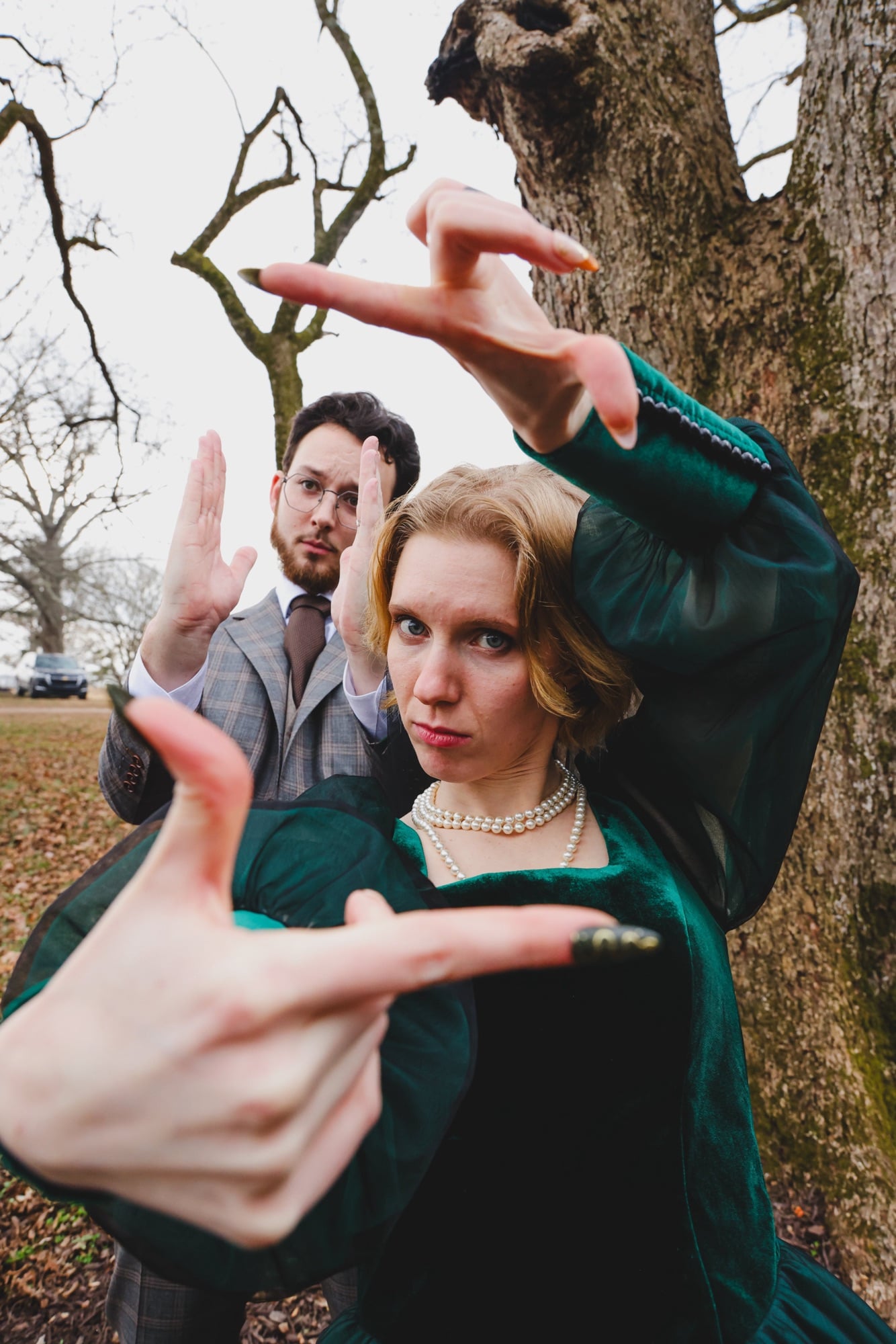 Creative wedding portrait of playful couple posing outdoors in Atlanta by Brian + Lindsey Photography